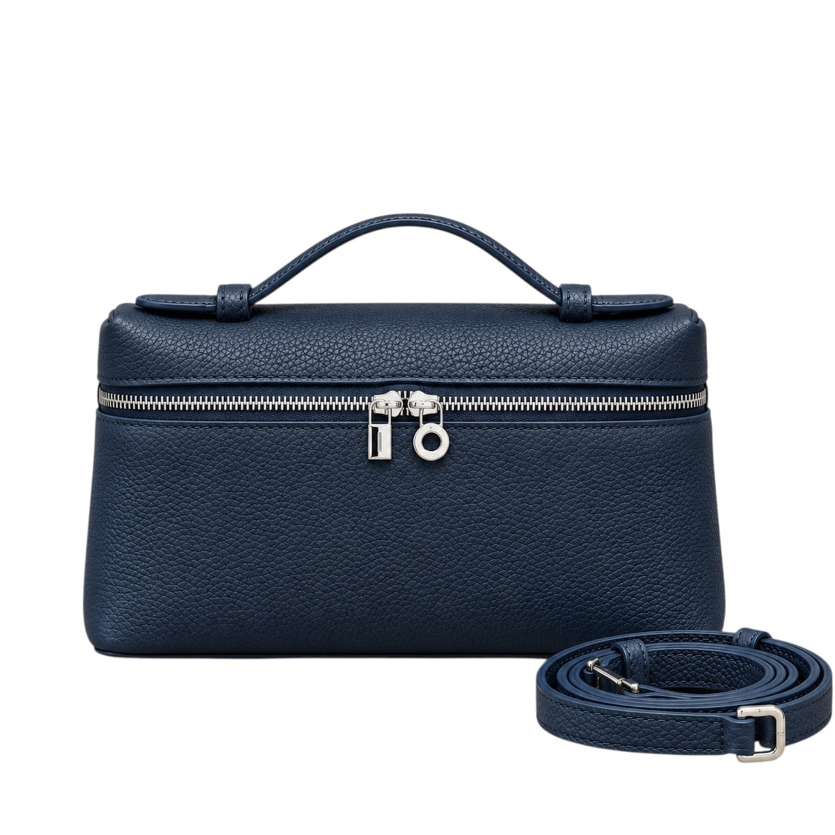 A Lucca classic grain navy blue leather handbag with a top handle, silver zipper, and lock, shown with a detachable crossbody shoulder strap, by Bella Dove