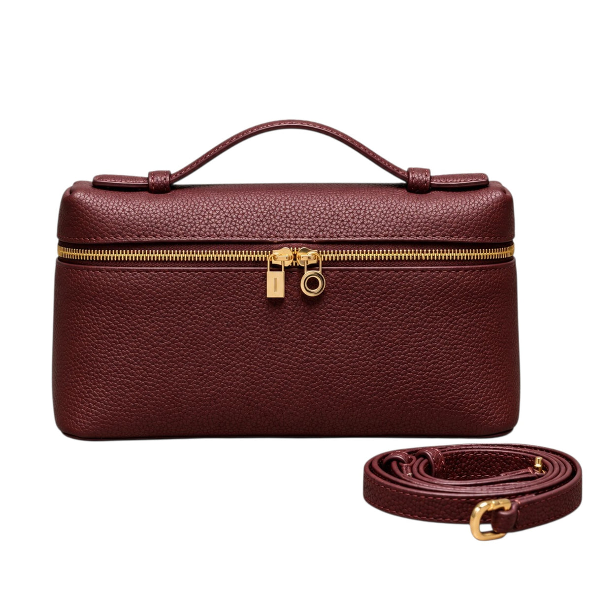 A burgundy Lucca classic grain leather handbag by Bella Dove with a top handle, gold zipper, and a matching detachable shoulder strap.