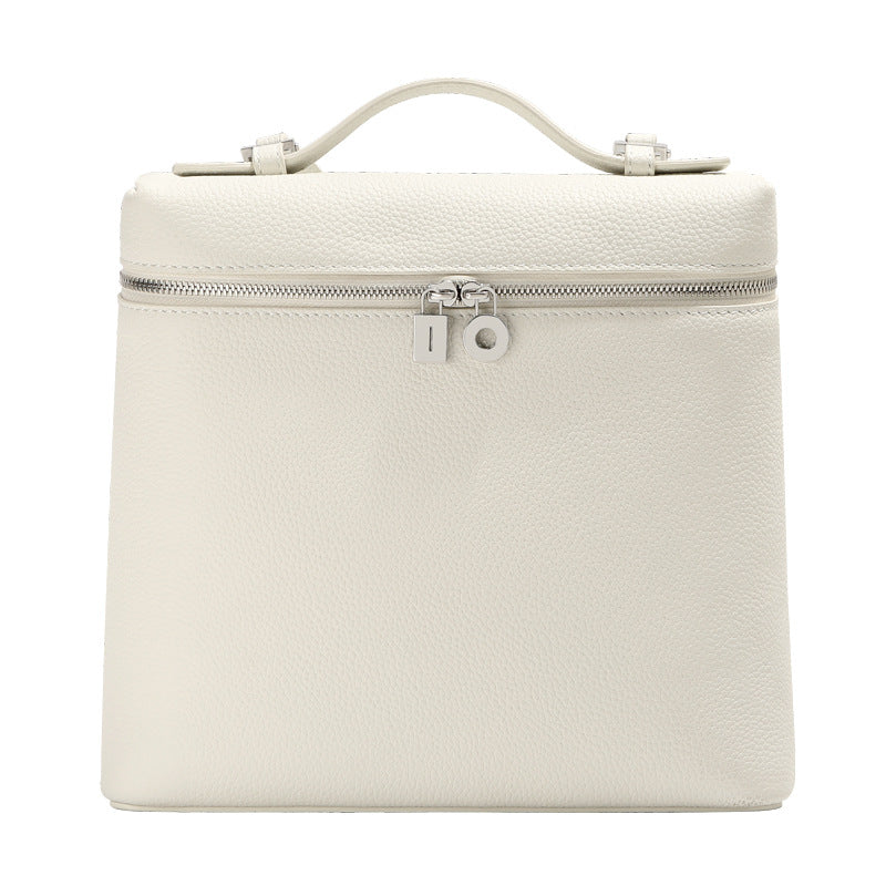 Women's mini genuine leather backpack in white with top handle and silver zip